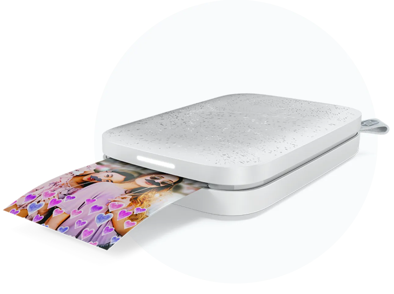 White portable photo printer printing a photo