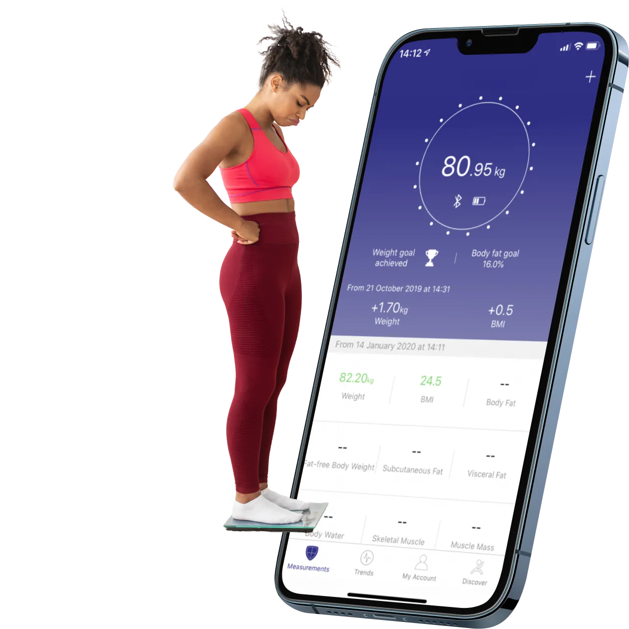 Woman in workout clothes on a smart scale, beside a phone showing her weight and body stats